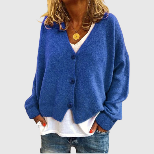 My Store Priska blue oversized knit cardigan with V-neck and button-down front worn over a white shirt