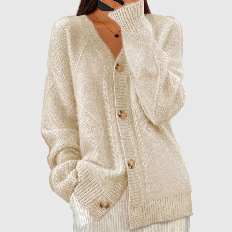 My Store Kathrin oversized beige knit cardigan with V-neck, button front, and cable knit details on a model.