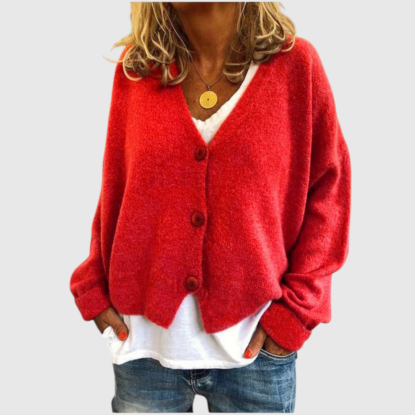 My Store Priska oversized red knit cardigan with V-neck and button front worn over a white shirt and blue jeans