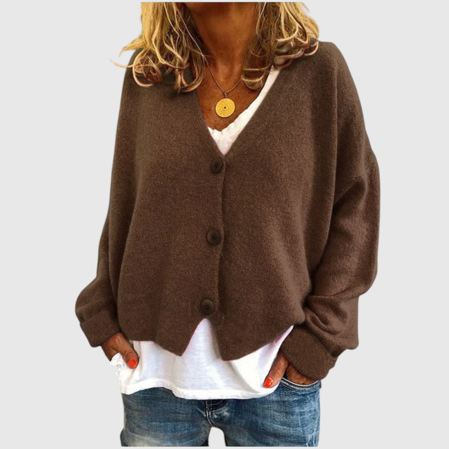 My Store Priska brown oversized V-neck cardigan with button front, worn over a white shirt and blue jeans