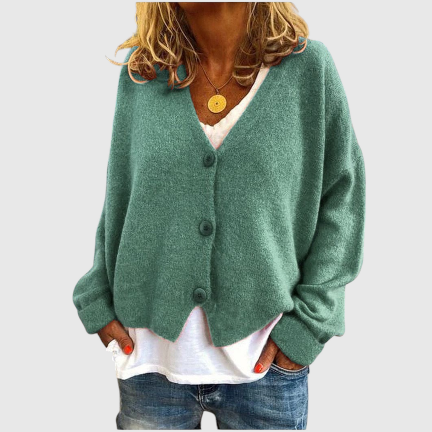 My Store Priska oversized green knit cardigan with V-neck and button front worn over a white top and blue jeans